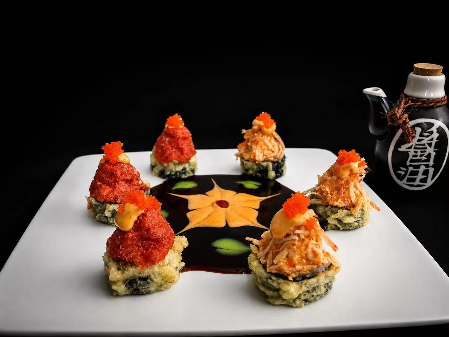 Tempura-style sushi bites topped with spicy sauce and fish roe at Wasu Sushi Ramen, a Sushi restaurant in Bedminster